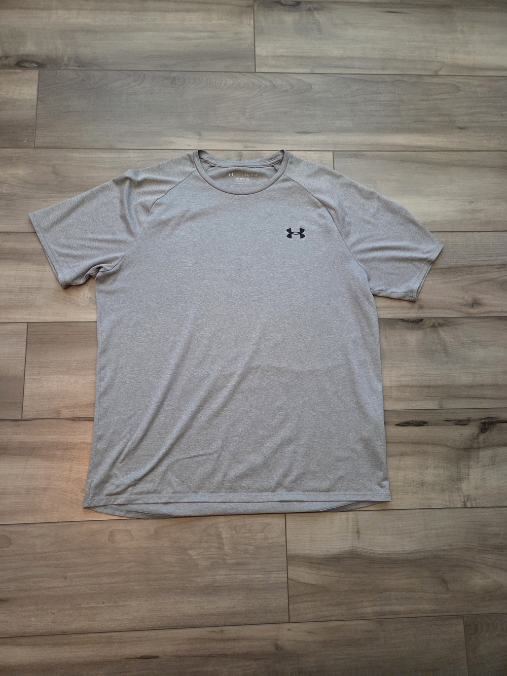 Under Armour Short Sleeve Athletic T-Shirt in Light Gray with Black Logo
